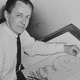 Image for article titled Charles Schulz Estate Releases Hundreds Of Rare, Never-Before-Seen Images Of Him Posing Next To An Easel